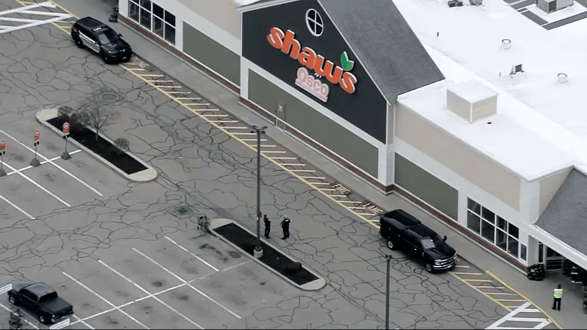 Police outside a Shaw's supermarket in Canton, Massachusetts, on Wednesday, March 26, 2025. Police said a bomb threat had been reported.