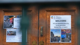 A sign that prohibits the entrance of ICE or Homeland Security is posted on a door at St. Paul and St. Andrew United Methodist Church in New York