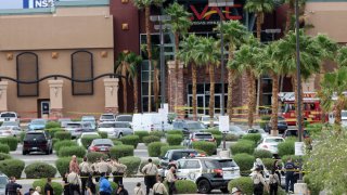 Las Vegas police investigate following an officer involved shooting that left a suspect dead at Las Vegas Athletic Club
